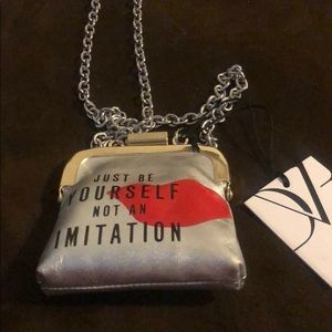 Diane von furstenberg coin purse with chain